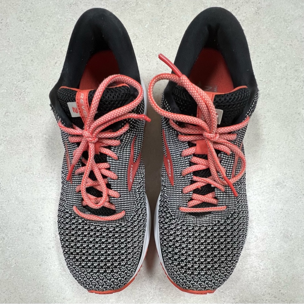 Woman’s Brooks tennis shoes.